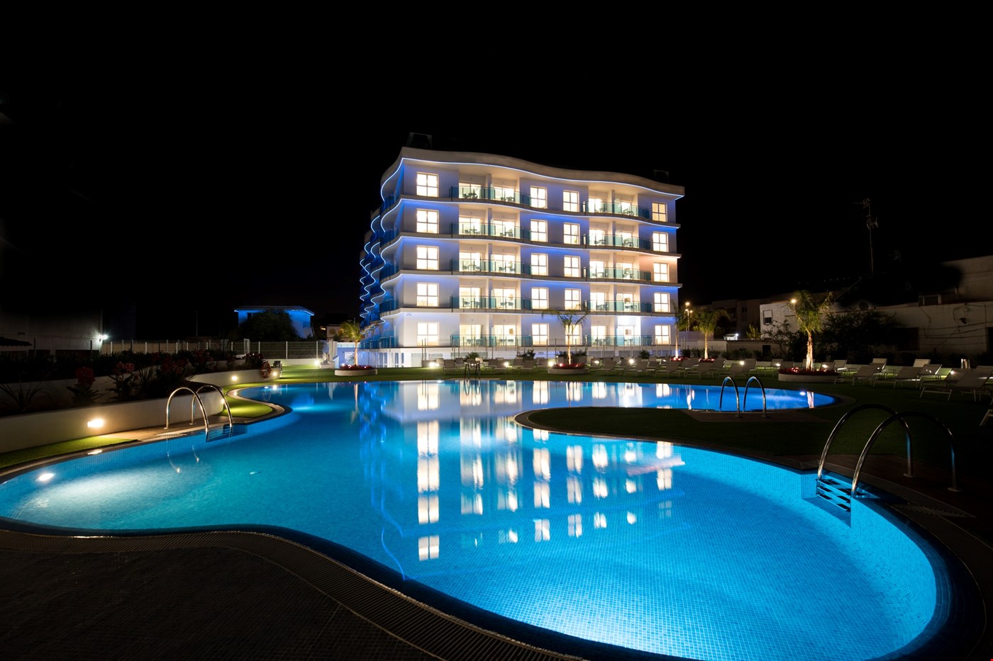 Hotel Castello Spain nomad remote 493454d2-0341-4df8-8b5f-2ca33d1d128a_Sea Experience Night view pool .jpg